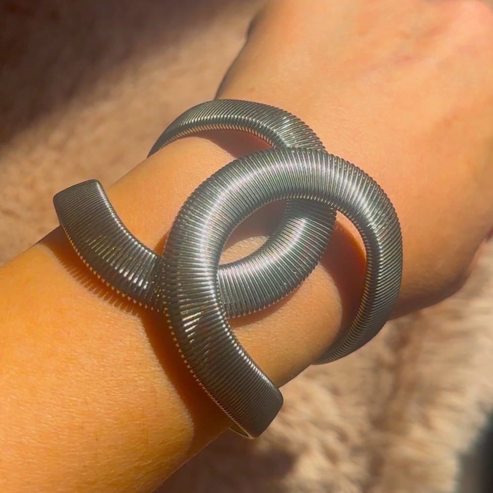 NWOT: Beautiful silver colored slip on slip off bracelet